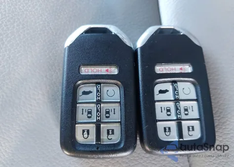 2022 Honda Odyssey Touring z USA, uszkodzony, nr VIN 5FNRL6H87NB043416